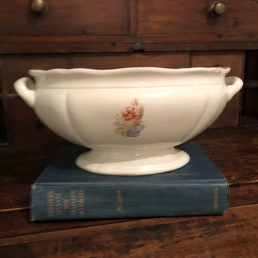 Antique serving bowl. This item is very old and does have a few chips